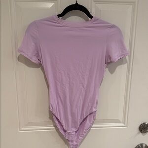 Skims Lavender Short Sleeve Bodysuit